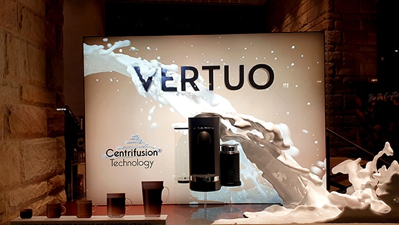 a 3D printed window display, featuring a Vertuo coffee machine created with additive manufacturing